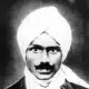 A black-and-white portrait of Subramania Bharati, an influential Indian poet and freedom fighter, wearing a turban.
